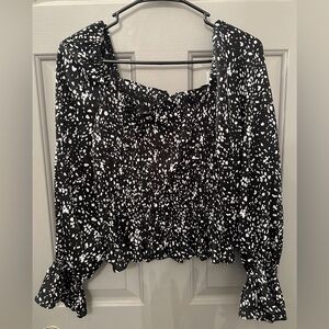 Black and white cropped blouse
